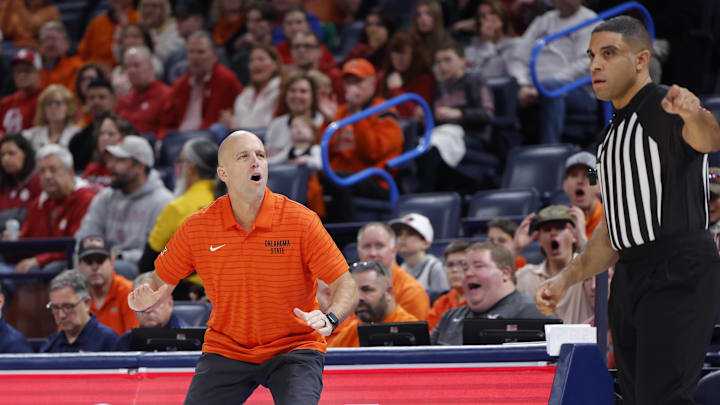 Dec 13, 2025; Oklahoma City, Oklahoma, USA; Oklahoma State Cowboys head coach Steve Lutz reacts to an officials call during the first half at Paycom Center. Mandatory Credit: Alonzo Adams-Imagn Images Dec 13, 2025; Oklahoma City, Oklahoma, USA; Oklahoma State Cowboys head coach Steve Lutz reacts to an officials call during the first half at Paycom Center. Mandatory Credit: Alonzo Adams-Imagn Images