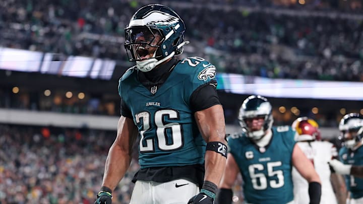 Jan 26, 2025; Philadelphia, PA, USA; Philadelphia Eagles running back Saquon Barkley (26) celebrates after a touchdown against the Washington Commanders during the second half in the NFC Championship game at Lincoln Financial Field. Mandatory Credit: Bill Streicher-Imagn Images Jan 26, 2025; Philadelphia, PA, USA; Philadelphia Eagles running back Saquon Barkley (26) celebrates after a touchdown against the Washington Commanders during the second half in the NFC Championship game at Lincoln Financial Field. Mandatory Credit: Bill Streicher-Imagn Images