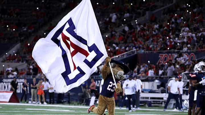 Sep 2, 2023; Tucson, Arizona, USA; Arizona Wildcats mascot, Wilbur, runs in the field during and game against the Northern Arizona Lumberjacks during the second half at Arizona Stadium. Mandatory Credit: Zac BonDurant-Imagn Images