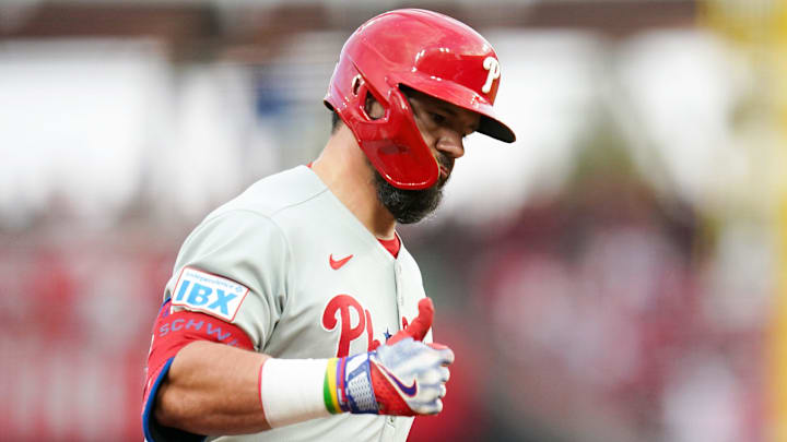 Philadelphia Phillies designated hitter Kyle Schwarber (12) gestures while running the bases after hitting a home run in the eighth inning of a MLB game between the Cincinnati Reds and Philadelphia Phillies, Monday, Aug. 11, 2025, at Great American Ball Park in downtown Cincinnati. Phillies won 4-1.