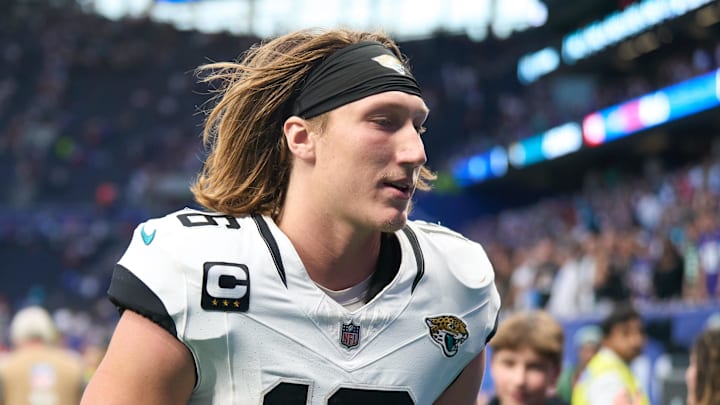 Oct 8, 2023; London, United Kingdom; Jacksonville Jaguars quarterback Trevor Lawrence (16) leaves the field after an NFL International Series game against the Buffalo Bills at Tottenham Hotspur Stadium. Mandatory Credit: Peter van den Berg-Imagn Images