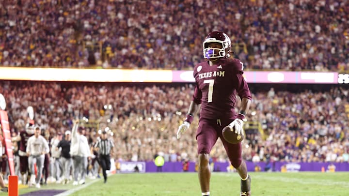 Oct 25, 2025; Baton Rouge, Louisiana, USA; Texas A&M Aggies wide receiver KC Concepcion (7) returns a punt for a touchdown during the second half against the Louisiana State Tigers at Tiger Stadium. Mandatory Credit: Stephen Lew-Imagn Images