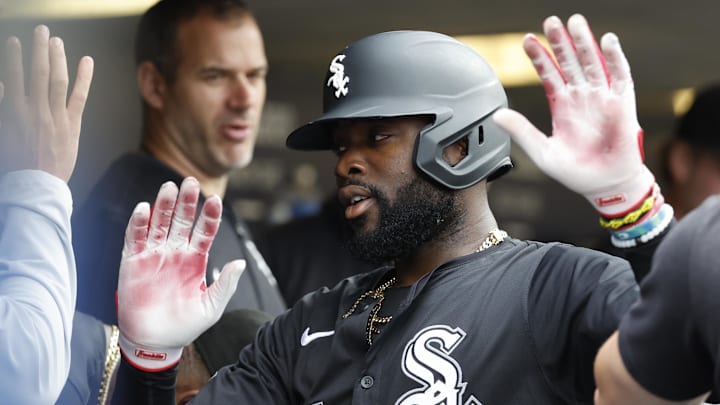 Sep 29, 2024; Detroit, Michigan, USA;  Chicago White Sox third baseman Bryan Ramos (44) receives congratulations from teammates after scoring in the second inning against the Detroit Tigers at Comerica Park. Mandatory Credit: Rick Osentoski-Imagn Images