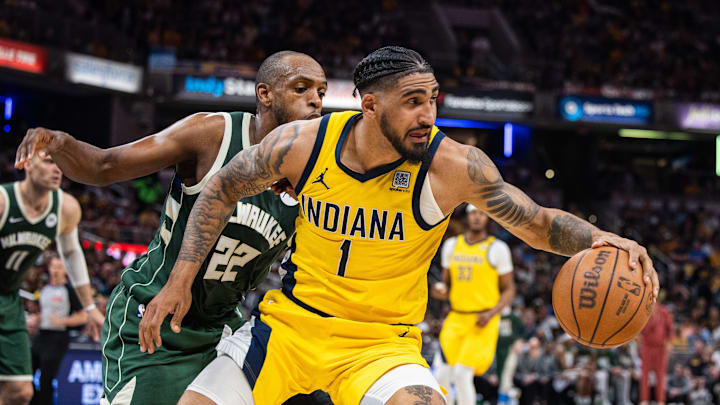Apr 28, 2024; Indianapolis, Indiana, USA; Indiana Pacers forward Obi Toppin (1) dribbles the ball