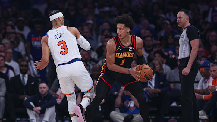 Apr 18, 2026; New York, New York, USA; Atlanta Hawks forward Jalen Johnson (1) is guarded by New York Knicks guard Josh Hart (3) during the first half of the 2026 NBA Playoffs at Madison Square Garden. Mandatory Credit: Vincent Carchietta-Imagn Images