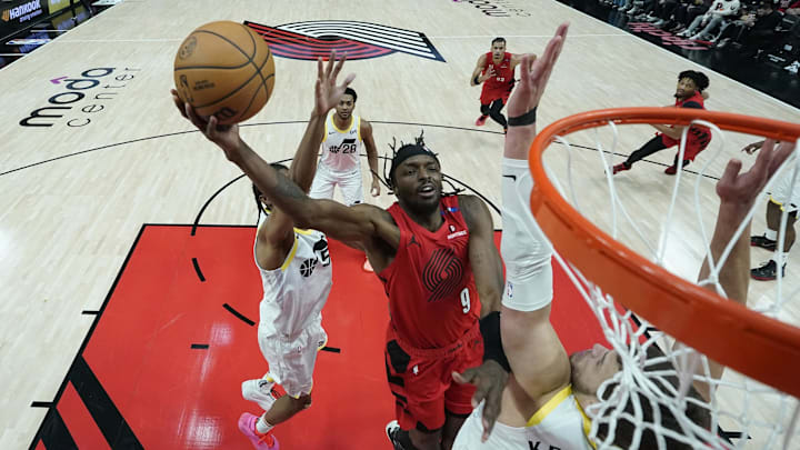 Dec 26, 2024; Portland, Oregon, USA; Portland Trail Blazers small forward Jerami Grant (9) shoots the ball against Utah Jazz center Walker Kessler (24) during the second half at Moda Center. Mandatory Credit: Soobum Im-Imagn Images Dec 26, 2024; Portland, Oregon, USA; Portland Trail Blazers small forward Jerami Grant (9) shoots the ball against Utah Jazz center Walker Kessler (24) during the second half at Moda Center. Mandatory Credit: Soobum Im-Imagn Images