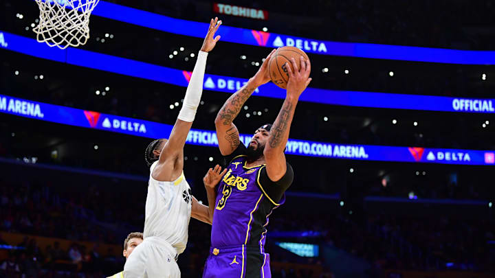 Nov 19, 2024; Los Angeles, California, USA; Los Angeles Lakers forward Anthony Davis (3) moves to the basket against the Utah Jazz during the first half at Crypto.com Arena. Mandatory Credit: Gary A. Vasquez-Imagn Images