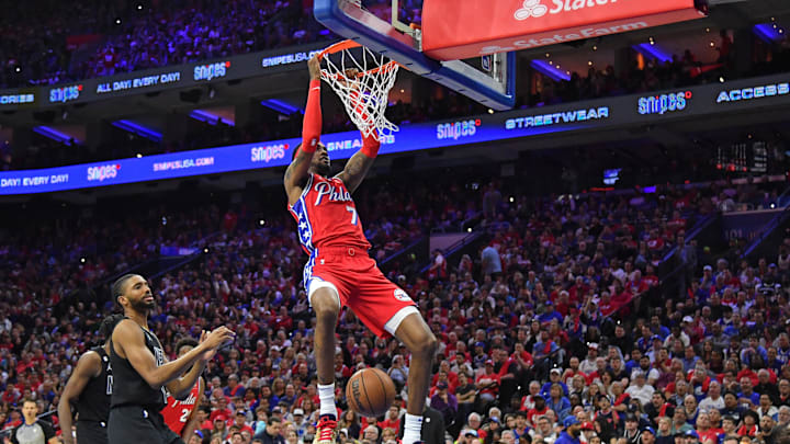 Apr 15, 2023; Philadelphia, Pennsylvania, USA; Philadelphia 76ers forward Jalen McDaniels (7) slam dunks against the Brooklyn Nets during the third quarter of game one of the 2023 NBA playoffs at Wells Fargo Center. Mandatory Credit: Eric Hartline-Imagn Images