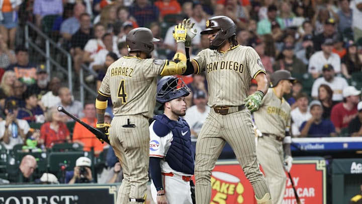Apr 19, 2025; Houston, Texas, USA; San Diego Padres first baseman Luis Arraez (4) celebrates right fielder Fernando Tatis Jr. (23) home run against the Houston Astros in the third inning at Daikin Park. Mandatory Credit: Thomas Shea-Imagn Images Apr 19, 2025; Houston, Texas, USA; San Diego Padres first baseman Luis Arraez (4) celebrates right fielder Fernando Tatis Jr. (23) home run against the Houston Astros in the third inning at Daikin Park. Mandatory Credit: Thomas Shea-Imagn Images