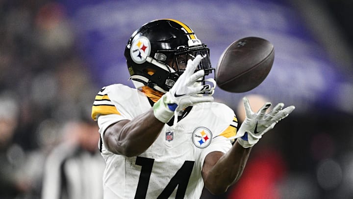 Jan 11, 2025; Baltimore, Maryland, USA; Pittsburgh Steelers wide receiver George Pickens (14) makes a catch against the Baltimore Ravens in the third quarter in an AFC wild card game at M&T Bank Stadium. Mandatory Credit: Tommy Gilligan-Imagn Images