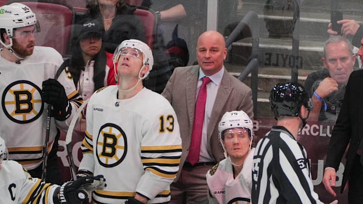 Mar 26, 2024; Sunrise, Florida, USA; Boston Bruins head coach Jim Montgomery looks on during the third period against the Florida Panthers at Amerant Bank Arena. Mandatory Credit: Jim Rassol-Imagn Images