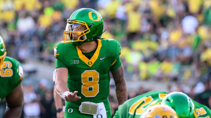 Aug 31, 2024; Eugene, Oregon, USA; Oregon Ducks quarterback Dillon Gabriel (8) surveys the defense during the third quarter against the Idaho Vandals at Autzen Stadium. Mandatory Credit: Craig Strobeck-USA TODAY Sports