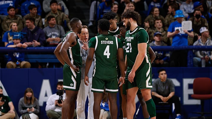 Jan 22, 2022; Colorado Springs, Colorado, USA; Colorado State Rams head coach Niko Medved talks with guard Chandler Jacobs (13) and guard Isaiah Stevens (4) and forward Dischon Thomas (11) and guard Kendle Moore (3) and guard David Roddy (21) in the second half against the Air Force Falcons at Clune Arena. Mandatory Credit: Isaiah J. Downing-Imagn Images