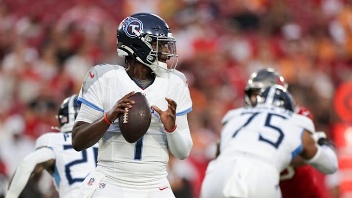 Tennessee Titans quarterback Cameron Ward drops back to pass against the Tampa Bay Buccaneers. Mandatory Credit: Nathan Ray Seebeck-Imagn Images
