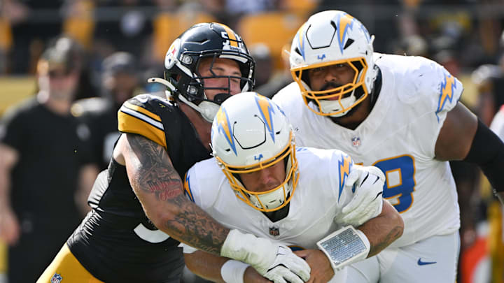 Sep 22, 2024; Pittsburgh, Pennsylvania, USA; Pittsburgh Steelers linebacker Nick Herbig (51) sacks Los Angeles Chargers quarterback Taylor Heinicke (8) during the third quarter at Acrisure Stadium. Mandatory Credit: Barry Reeger-Imagn Images