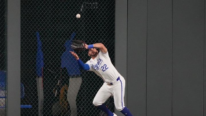 Oct 10, 2024; Kansas City, Missouri, USA; Kansas City Royals outfielder Tommy Pham (22) catches a fly-ball during the ninth inning against the New York Yankees during game four of the ALDS for the 2024 MLB Playoffs at Kauffman Stadium. Mandatory Credit: Denny Medley-Imagn Images