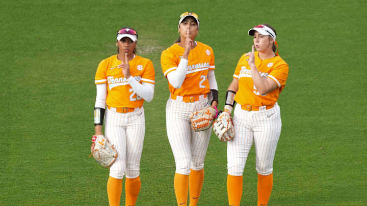 Tennessee outfielder Saviya Morgan (20), Tennessee outfielder Kinsey Fiedler (27), and Tennessee outfielder Gabby Leach (55)  before an NCAA softball game at Sherri Parker Lee Stadium in Knoxville, Tenn.