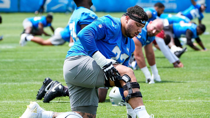 Detroit Lions guard Christian Mahogany (73) practices during OTA at Meijer Performance Center in Allen Park on Friday, May 30, 2025.