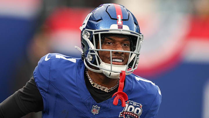 Dec 29, 2024; East Rutherford, New Jersey, USA; New York Giants wide receiver Malik Nabers (1) celebrates after a touchdown reception during the second half against the Indianapolis Colts at MetLife Stadium. Mandatory Credit: Vincent Carchietta-Imagn Images