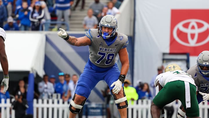 Oct 25, 2025; Memphis, Tennessee, USA; Memphis Tigers offensive lineman Travis Burke (78) gestures toward the South Florida Bulls defense on the line of scrimmage during the second half at Simmons Bank Liberty Stadium. Mandatory Credit: Wesley Hale-Imagn Images