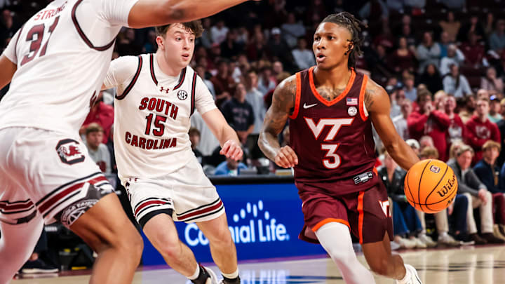 Dec 2, 2025; Columbia, South Carolina, USA; Virginia Tech Hokies guard Ben Hammond (3) drives around South Carolina Gamecocks guard Eli Ellis (15) in the second half at Colonial Life Arena. Mandatory Credit: Jeff Blake-Imagn Images Dec 2, 2025; Columbia, South Carolina, USA; Virginia Tech Hokies guard Ben Hammond (3) drives around South Carolina Gamecocks guard Eli Ellis (15) in the second half at Colonial Life Arena. Mandatory Credit: Jeff Blake-Imagn Images