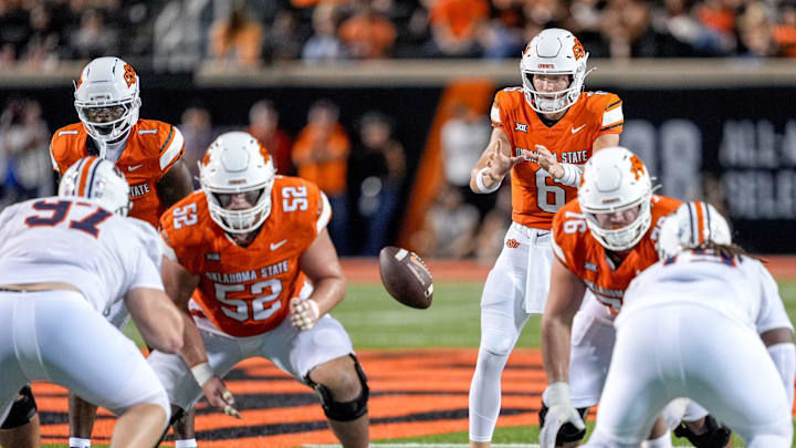 Oklahoma State quarterback Zane Flores (6) takes a snap in the third quarter during an NCAA football game between Oklahoma State (OSU) and UT Martin in Stillwater, Okla., on Thursday, Aug. 28, 2025. Oklahoma State quarterback Zane Flores (6) takes a snap in the third quarter during an NCAA football game between Oklahoma State (OSU) and UT Martin in Stillwater, Okla., on Thursday, Aug. 28, 2025.