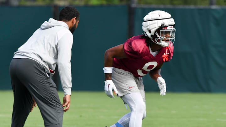 The Crimson Tide football team continued practice Thursday, Aug. 1, 2024, as they prepare for the season opener and the first game under new head coach Kalen DeBoer. Alabama defensive back Jaylen Mbakwe (9) runs a drill using a band to restrict his lower legs. The Crimson Tide football team continued practice Thursday, Aug. 1, 2024, as they prepare for the season opener and the first game under new head coach Kalen DeBoer. Alabama defensive back Jaylen Mbakwe (9) runs a drill using a band to restrict his lower legs.