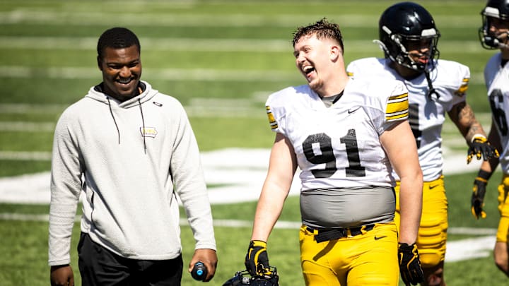Apr 26, 2025; Iowa City, IA, USA; Iowa defensive lineman Jonah Pace (91) laughs with teammates during a spring NCAA football open practice at Kinnick Stadium. Mandatory Credit: Joseph Cress/For the Register