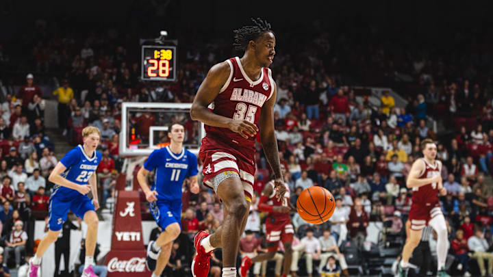 Dec 14, 2024; Tuscaloosa, Alabama, USA; Alabama Crimson Tide forward Derrion Reid (35) drives the ball against the Creighton Bluejays during the second half at Coleman Coliseum. Mandatory Credit: Will McLelland-Imagn Images