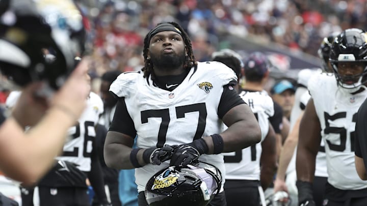 Sep 29, 2024; Houston, Texas, USA; Jacksonville Jaguars offensive tackle Anton Harrison (77) during the game against the Houston Texans at NRG Stadium. Mandatory Credit: Troy Taormina-Imagn Images
