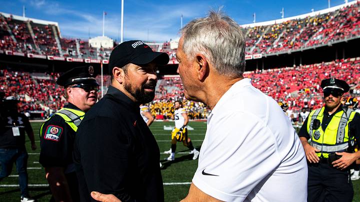 Ohio State head coach Ryan Day, left, shakes hands with Iowa head coach Kirk Ferentz after a NCAA football game, Saturday, Oct. 22, 2022, at Ohio Stadium in Columbus, Ohio. Ohio State head coach Ryan Day, left, shakes hands with Iowa head coach Kirk Ferentz after a NCAA football game, Saturday, Oct. 22, 2022, at Ohio Stadium in Columbus, Ohio.