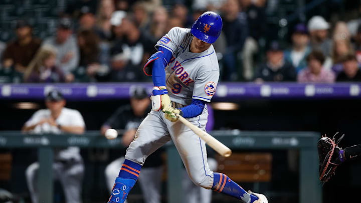 May 26, 2023; Denver, Colorado, USA; New York Mets center fielder Brandon Nimmo (9) hits a triple in