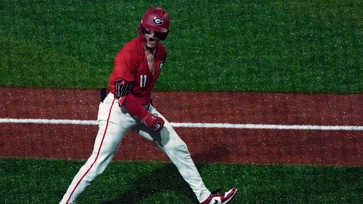 Georgia's Henry Hunter (11) celebrates after scoring a home run during a NCAA baseball game against Kentucky on March 14, 2025.