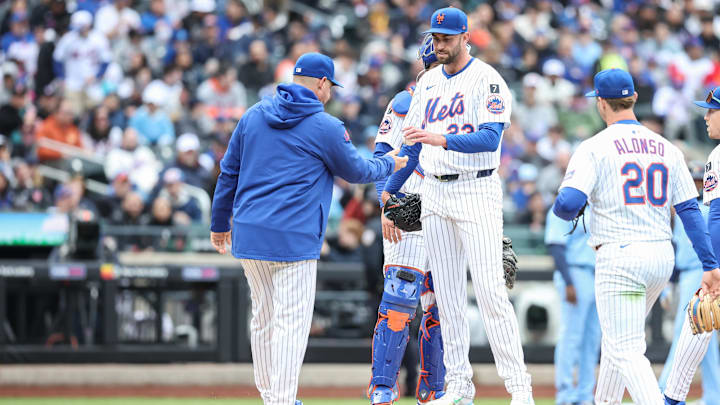 Apr 6, 2025; New York City, New York, USA; New York Mets starting pitcher David Peterson (23) is taken out of the game in the fifth inning by manager Carlos Mendoza (64) against the Toronto Blue Jays at Citi Field. Mandatory Credit: Wendell Cruz-Imagn Images Apr 6, 2025; New York City, New York, USA; New York Mets starting pitcher David Peterson (23) is taken out of the game in the fifth inning by manager Carlos Mendoza (64) against the Toronto Blue Jays at Citi Field. Mandatory Credit: Wendell Cruz-Imagn Images