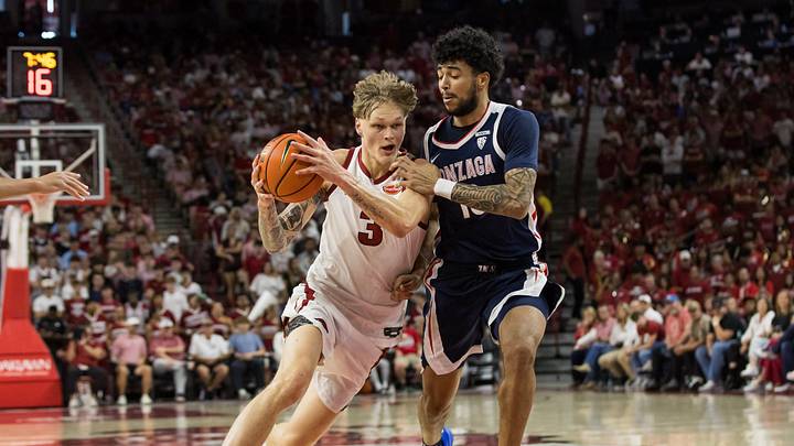 Oct 24, 2026; Fayetteville, AK, USA;  Arkansas Razorbacks forward Miikka Muurinen (3) drives to the basket past Gonzaga Bulldogs forward Izan Almansa (13) during the first half at Bud Walton Arena.  Mandatory Credit: Brett Rojo-Imagn Images