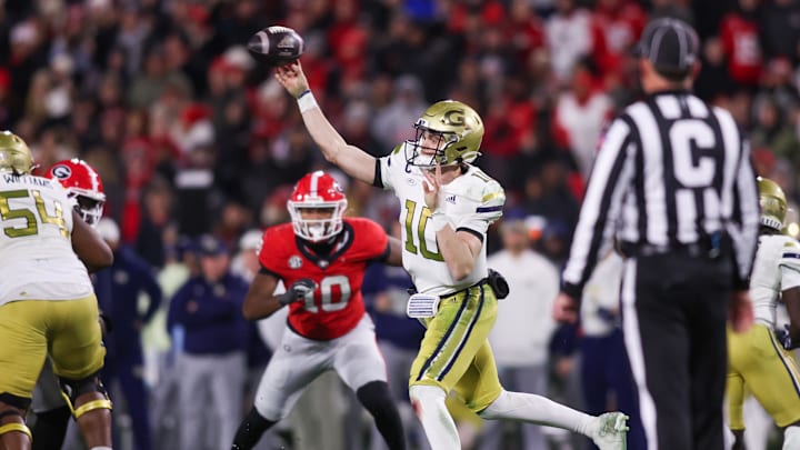 Nov 29, 2024; Athens, Georgia, USA; Georgia Tech Yellow Jackets quarterback Haynes King (10) throws a pass against the Georgia Bulldogs in the third quarter at Sanford Stadium. Mandatory Credit: Brett Davis-Imagn Images Nov 29, 2024; Athens, Georgia, USA; Georgia Tech Yellow Jackets quarterback Haynes King (10) throws a pass against the Georgia Bulldogs in the third quarter at Sanford Stadium. Mandatory Credit: Brett Davis-Imagn Images