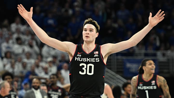 Feb 11, 2025; Omaha, Nebraska, USA; Connecticut Huskies forward Liam McNeeley (30) celebrates a basket against the Creighton Bluejays during the second half at CHI Health Center Omaha. Mandatory Credit: Steven Branscombe-Imagn Images Feb 11, 2025; Omaha, Nebraska, USA; Connecticut Huskies forward Liam McNeeley (30) celebrates a basket against the Creighton Bluejays during the second half at CHI Health Center Omaha. Mandatory Credit: Steven Branscombe-Imagn Images