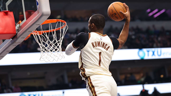Jan 22, 2026; Dallas, Texas, USA;  Golden State Warriors forward Jonathan Kuminga (1) dunks against the Dallas Mavericks during the first half at American Airlines Center. Mandatory Credit: Kevin Jairaj-Imagn Images