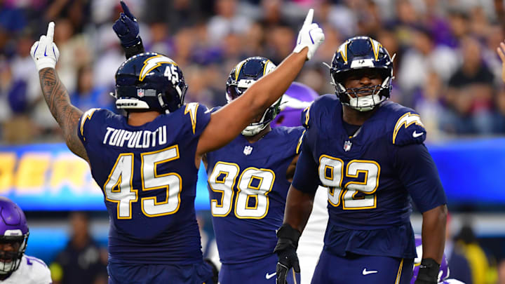 Oct 23, 2025; Inglewood, California, USA; Los Angeles Chargers defensive tackle Justin Eboigbe (92) reacts after a tackle against the Minnesota Vikings during the first half at SoFi Stadium. Mandatory Credit: Gary A. Vasquez-Imagn Images Oct 23, 2025; Inglewood, California, USA; Los Angeles Chargers defensive tackle Justin Eboigbe (92) reacts after a tackle against the Minnesota Vikings during the first half at SoFi Stadium. Mandatory Credit: Gary A. Vasquez-Imagn Images