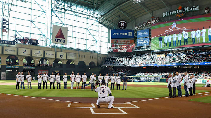 Aug 15, 2015; Houston, TX, USA; Houston Astros former manager Phil Garner throws out a ceremonial first pitch before a game against the Detroit Tigers at Minute Maid Park. 
