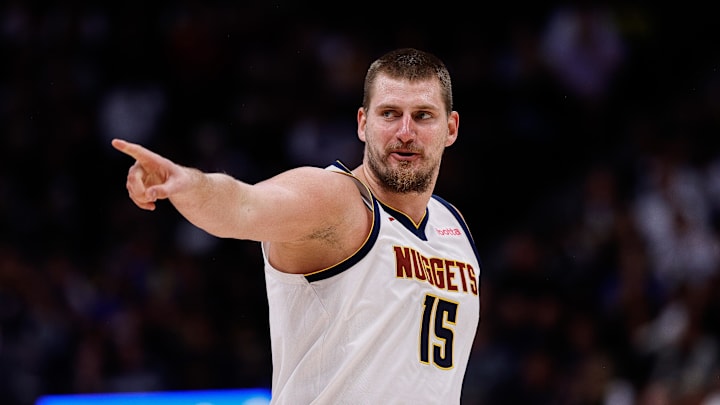 Denver Nuggets center Nikola Jokic (15) reacts after a play in the second quarter against the Phoenix Suns at Ball Arena. 