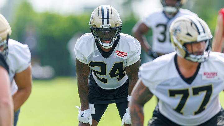 Jul 30, 2026; Metairie, LA, USA; New Orleans Saints running back Devin Neal (24) looks on during training camp at Ochsner Sports Performance Center. Mandatory Credit: Stephen Lew-Imagn Images Jul 30, 2026; Metairie, LA, USA; New Orleans Saints running back Devin Neal (24) looks on during training camp at Ochsner Sports Performance Center. Mandatory Credit: Stephen Lew-Imagn Images