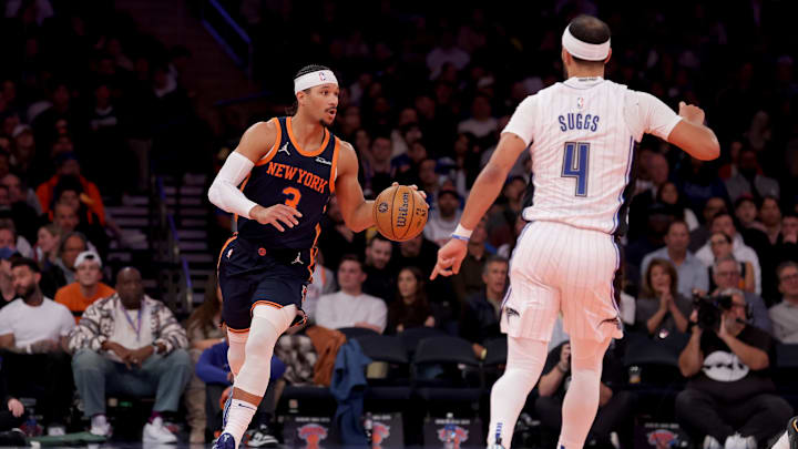 Dec 3, 2024; New York, New York, USA; New York Knicks guard Josh Hart (3) brings the ball up court against Orlando Magic guard Jalen Suggs (4) during the third quarter at Madison Square Garden. Mandatory Credit: Brad Penner-Imagn Images