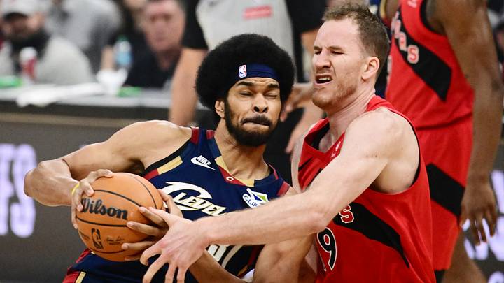 Cleveland Cavaliers center Jarrett Allen drives to the basket against Toronto Raptors center Jakob Poeltl. Cleveland Cavaliers center Jarrett Allen drives to the basket against Toronto Raptors center Jakob Poeltl.