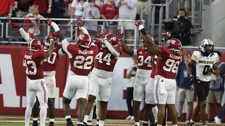 Oct 26, 2024; Tuscaloosa, Alabama, USA; Alabama Crimson Tide defenders celebrate after a goal line stand against the Missouri Tigers on fourth down to preserve a shut out during the second half at Bryant-Denny Stadium. Mandatory Credit: Butch Dill-Imagn Images Oct 26, 2024; Tuscaloosa, Alabama, USA; Alabama Crimson Tide defenders celebrate after a goal line stand against the Missouri Tigers on fourth down to preserve a shut out during the second half at Bryant-Denny Stadium. Mandatory Credit: Butch Dill-Imagn Images