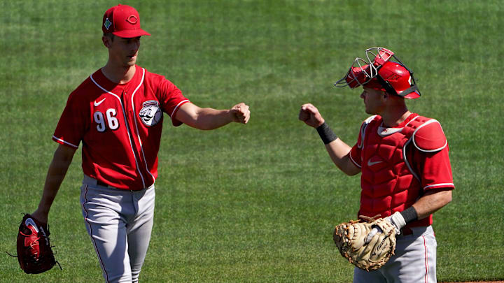 Cincinnati Reds non-roster invitee pitcher Brandon Williamson (96) fist bumps.