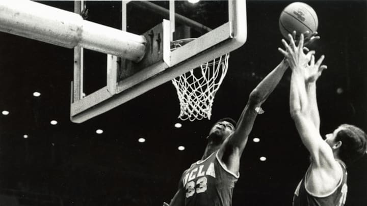 Unknown date & location, USA: FILE PHOTO; UCLA Bruins center Lew Alcindor (33) who later became known as Kareem Abdul-Jabbar grabs a rebound against the Houston Cougars during the 1967 season. Mandatory Credit: Malcolm Emmons- Imagn Images 
