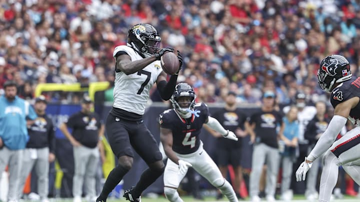 Sep 29, 2024; Houston, Texas, USA; Jacksonville Jaguars wide receiver Brian Thomas Jr. (7) makes a reception during the fourth quarter against the Houston Texans at NRG Stadium. Mandatory Credit: Troy Taormina-Imagn Images