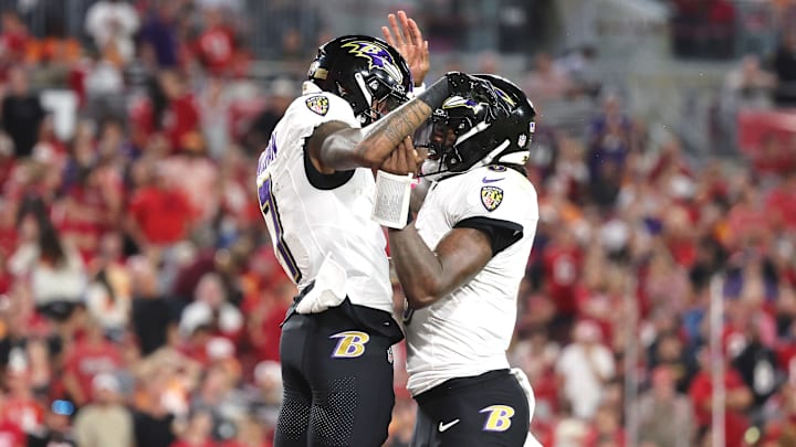 Baltimore Ravens wide receiver Rashod Bateman (7) is congratulated by quarterback Lamar Jackson (8) after he scored a touchdown against the Tampa Bay Buccaneers during the second half at Raymond James Stadium. 