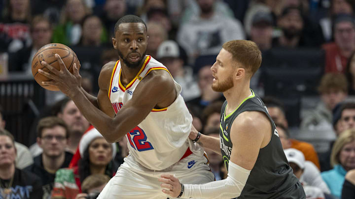 Dec 21, 2024; Minneapolis, Minnesota, USA; Golden State Warriors forward Andrew Wiggins (22) backs towards the basket as Minnesota Timberwolves guard Donte DiVincenzo (0) plays defense in the first half at Target Center. Mandatory Credit: Jesse Johnson-Imagn Images Dec 21, 2024; Minneapolis, Minnesota, USA; Golden State Warriors forward Andrew Wiggins (22) backs towards the basket as Minnesota Timberwolves guard Donte DiVincenzo (0) plays defense in the first half at Target Center. Mandatory Credit: Jesse Johnson-Imagn Images